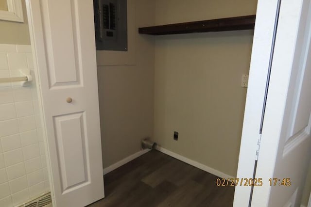 laundry room with visible vents, baseboards, dark wood finished floors, electric panel, and electric dryer hookup