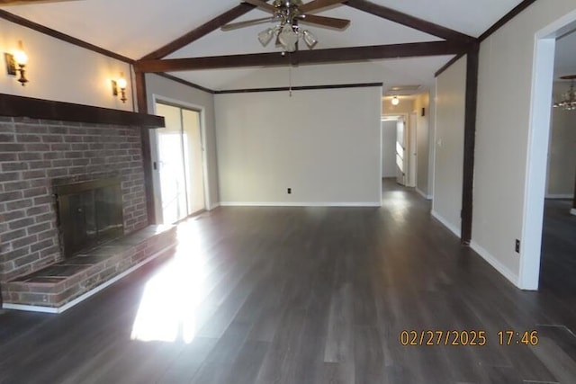 unfurnished living room with baseboards, wood finished floors, a fireplace, and vaulted ceiling with beams