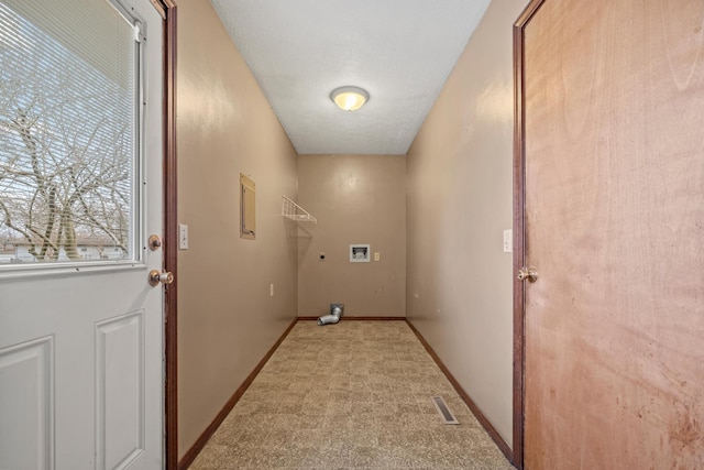 laundry area with hookup for an electric dryer, baseboards, light colored carpet, hookup for a washing machine, and laundry area