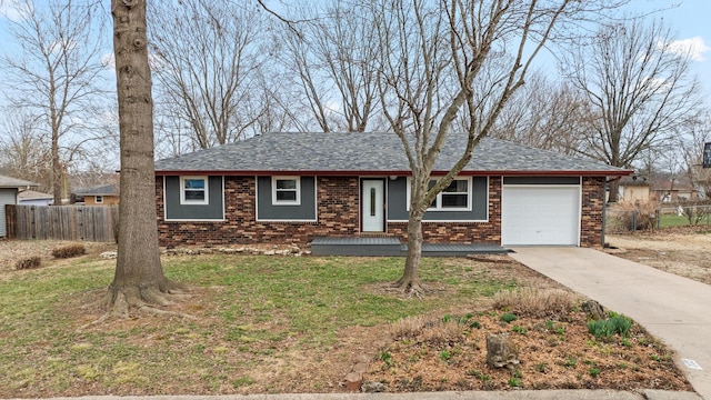 ranch-style house featuring a front lawn, driveway, fence, an attached garage, and brick siding