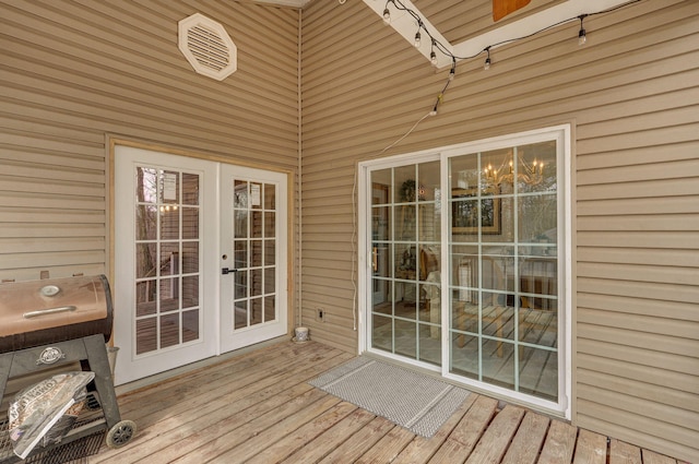 wooden deck with french doors