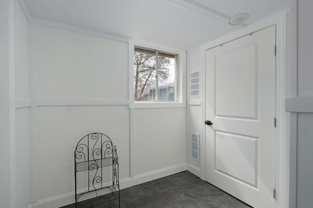 interior space with baseboards