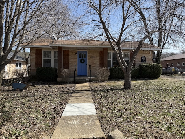 view of front facade featuring stone siding