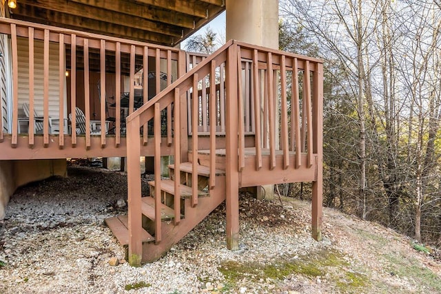 wooden terrace featuring stairway