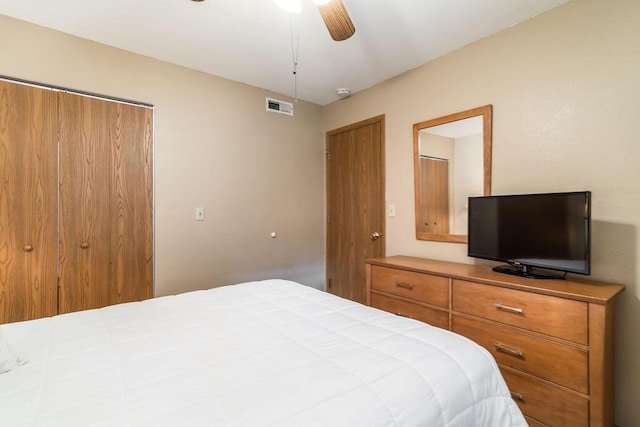 bedroom featuring visible vents and a ceiling fan