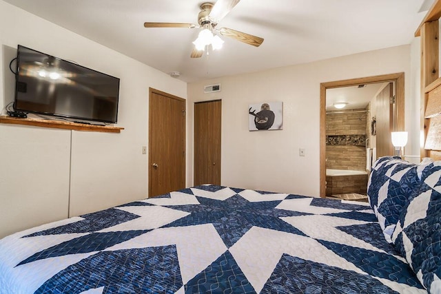 bedroom featuring visible vents, connected bathroom, and a ceiling fan