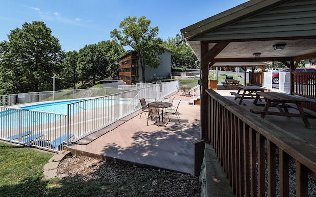 community pool featuring fence