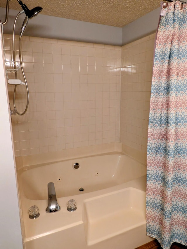 bathroom featuring a textured ceiling