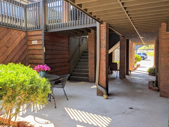 view of patio / terrace with stairway