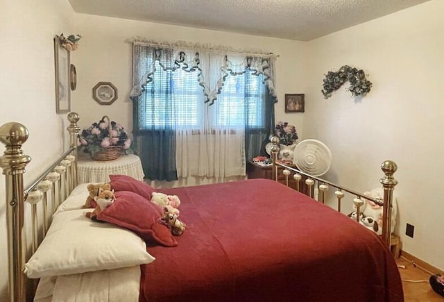 bedroom with a textured ceiling