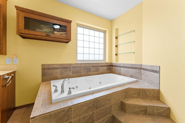 full bathroom with a whirlpool tub