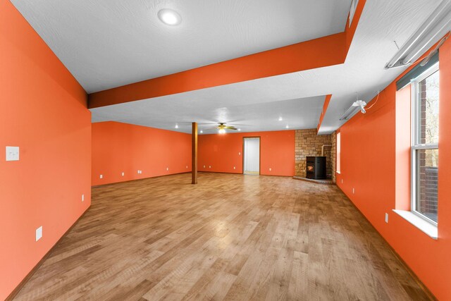 unfurnished living room featuring light wood-style floors and ceiling fan