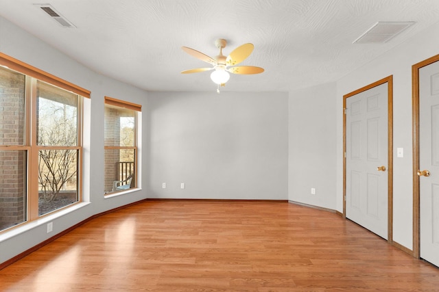 270 Craig Rd, Walnut Shade, MO 65771 - empty room with ceiling fan, visible vents, and light wood-type flooring