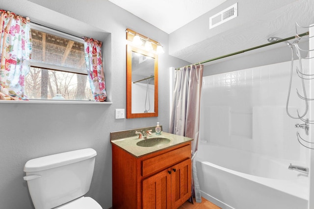 270 Craig Rd, Walnut Shade, MO 65771 - bathroom with visible vents, shower / bath combination with curtain, toilet, and vanity