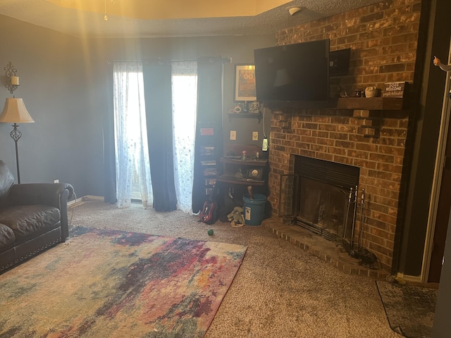 3494 S Christy Ct, Springfield, MO 65807 - carpeted living room featuring a textured ceiling and a brick fireplace