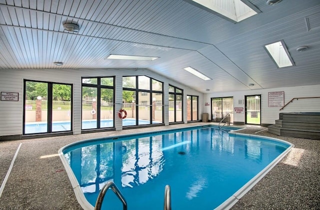 pool featuring a skylight