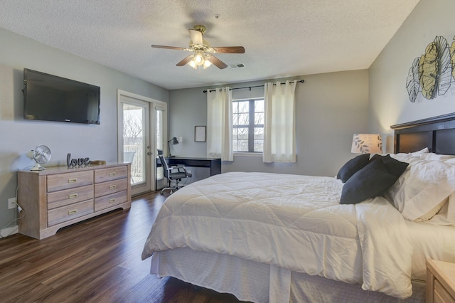 bedroom with a ceiling fan, visible vents, dark wood-type flooring, a textured ceiling, and access to outside