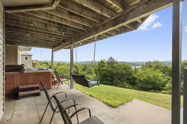 view of patio featuring a hot tub