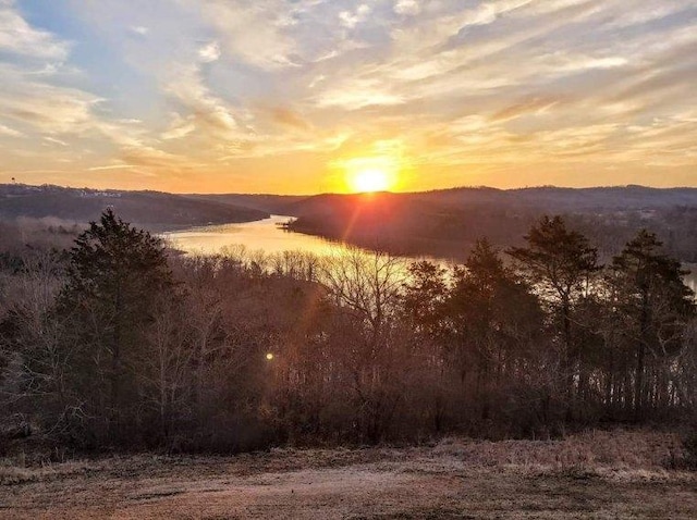 mountain view with a water view