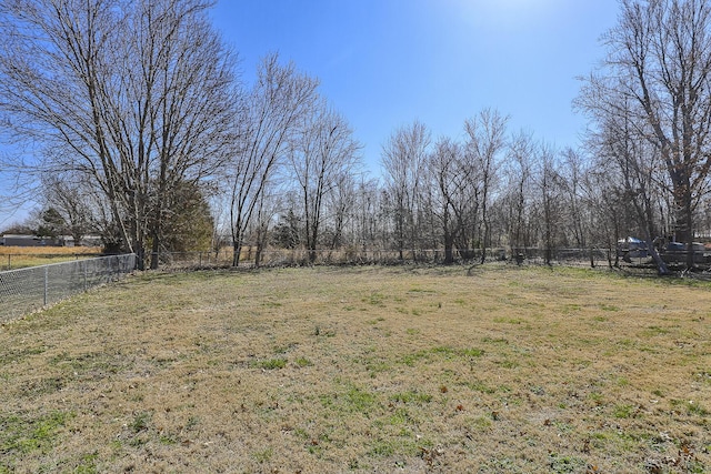 view of yard featuring fence