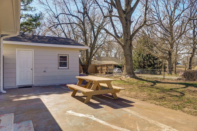 view of patio / terrace with outdoor dining space and fence