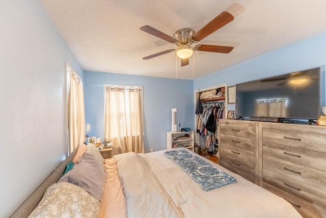 bedroom featuring a closet and ceiling fan