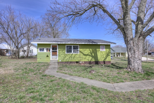 view of front of home with a front yard