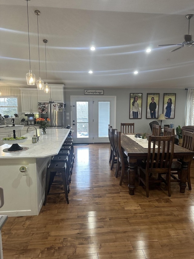 dining area with recessed lighting, dark wood-style flooring, and ceiling fan