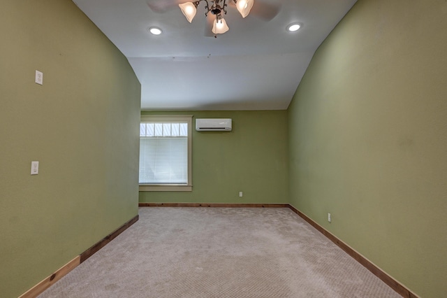 empty room featuring baseboards, ceiling fan, a wall mounted air conditioner, and carpet