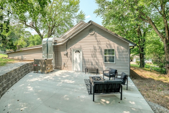 back of house featuring a patio area