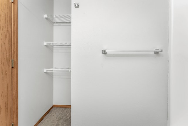 interior space featuring baseboards