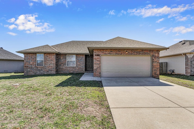 single story home with a front lawn, concrete driveway, an attached garage, a shingled roof, and brick siding