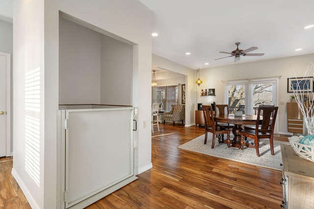 dining area featuring recessed lighting, baseboards, wood finished floors, and a ceiling fan