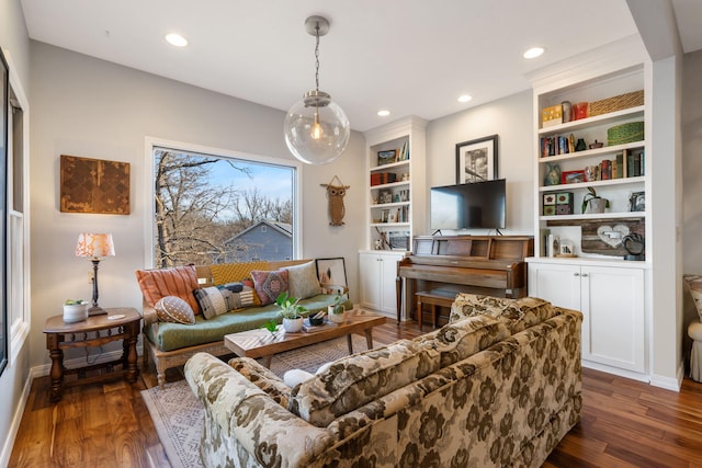 living room featuring recessed lighting, baseboards, and dark wood-type flooring