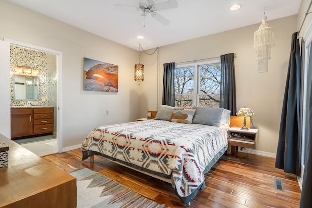 bedroom featuring recessed lighting, light wood-style floors, and baseboards