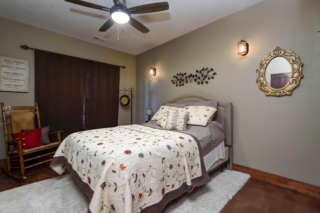 bedroom featuring visible vents, baseboards, and ceiling fan