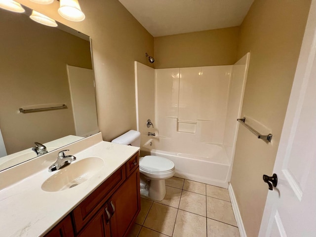 full bathroom featuring tile patterned floors, toilet, shower / tub combination, baseboards, and vanity