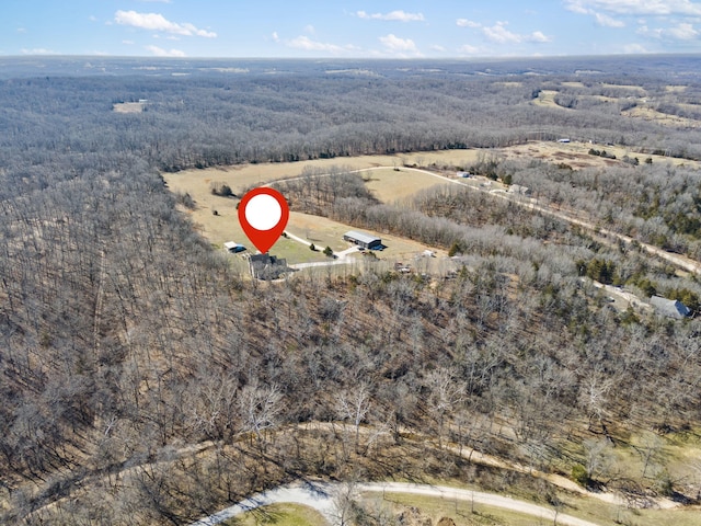 aerial view featuring a forest view