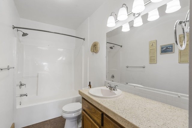 full bathroom with vanity, toilet, and  shower combination