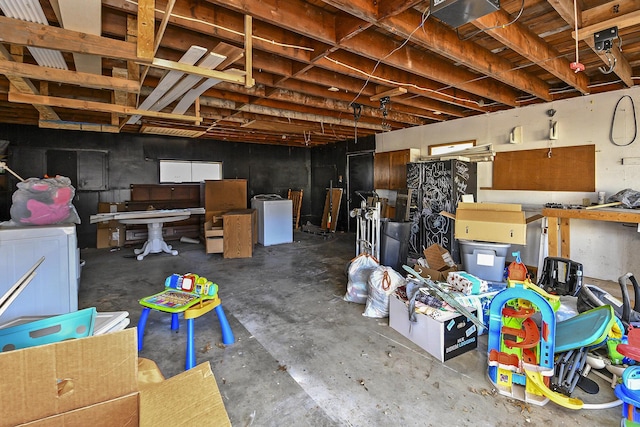 below grade area with washer / clothes dryer