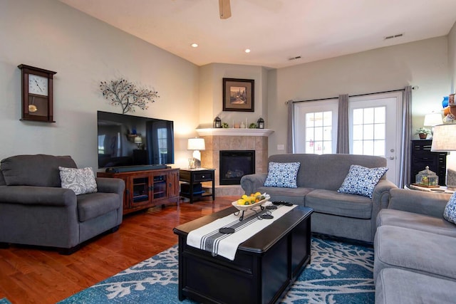 living room with visible vents, wood finished floors, recessed lighting, a fireplace, and ceiling fan