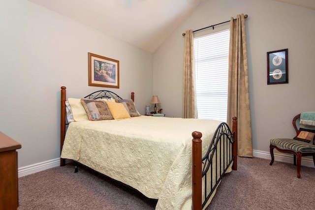 bedroom with baseboards, lofted ceiling, and carpet