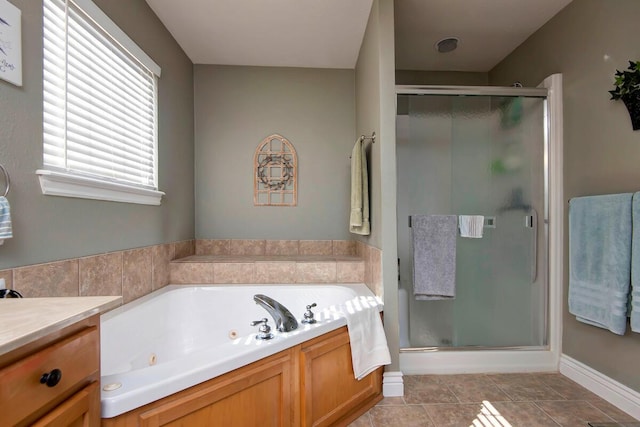 full bath featuring tile patterned floors, a tub with jets, a shower stall, and vanity