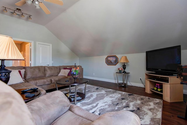 living room with track lighting, baseboards, lofted ceiling, wood finished floors, and a ceiling fan