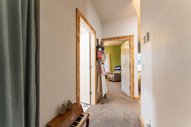 hallway with carpet flooring