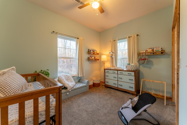 bedroom featuring carpet flooring and a ceiling fan