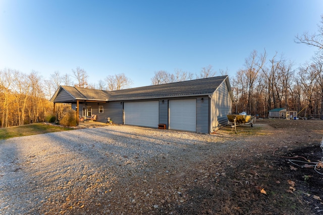 garage featuring driveway