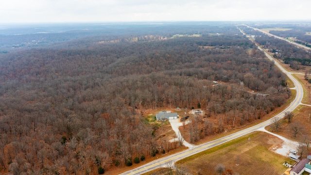 bird's eye view with a forest view and a rural view