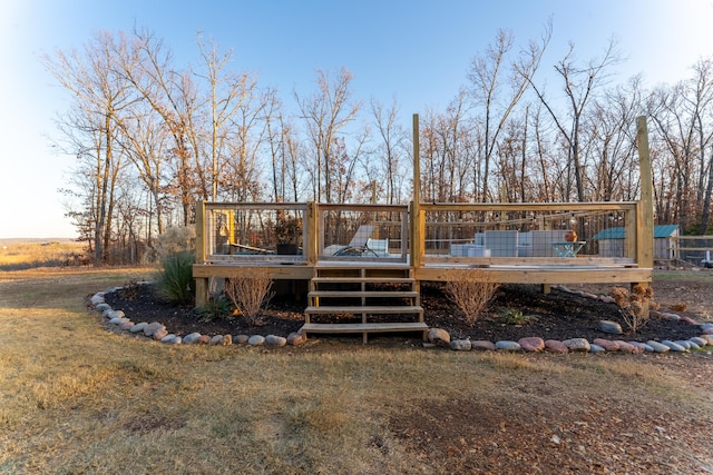 back of house with a wooden deck