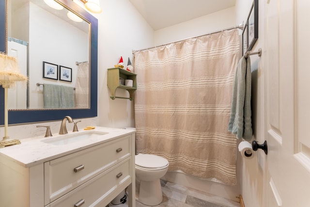 bathroom featuring toilet, vanity, and shower / bathtub combination with curtain